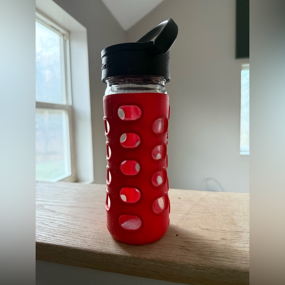 Red Glass Bottle with Black Lid